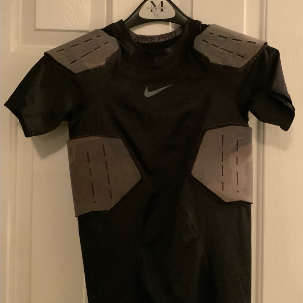 Nike football padded shirt, youth large